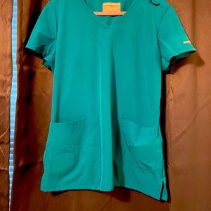 Sketchers scrubs size M in Teal.